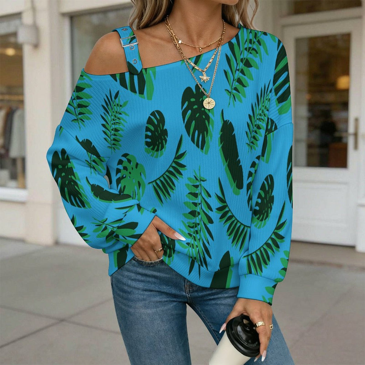 Fall Casual Asymmetric Shoulder Knit Top with Buckle Detail Blue Background, Green Leaves